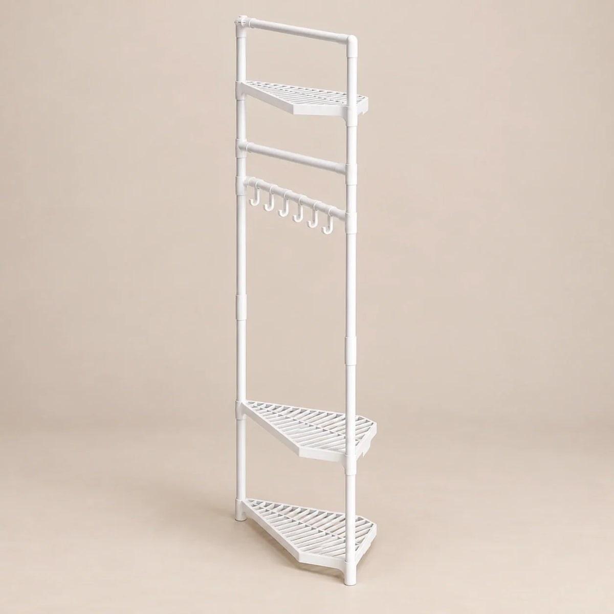Vue de profil du porte-manteau d’angle blanc et de la profondeur de ses tablettes