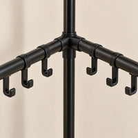Détail des petits crochets et des raccords du porte-manteau noir