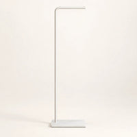 Porte-manteau valet design en métal blanc laqué de 170 cm sur fond clair