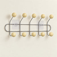 Crochet mural adhésif beige M - 41 cm : vue complète sur fond clair