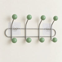Crochet mural adhésif vert menthe S - 33 cm : vue complète sur fond clair