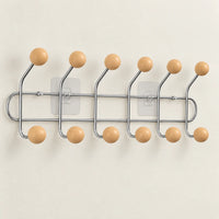 Crochet mural adhésif abricot L - 49 cm — sur fond clair