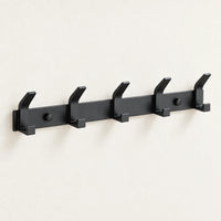 Crochet mural noir aluminium 5 crochets — sur fond clair