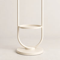 Portant sur pied design métal blanc crème 190 cm : détail de la base circulaire et de la finition métal