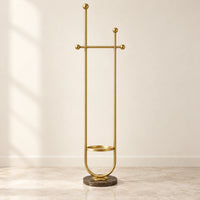 Portant sur pied design métal doré 190 cm : vue complète du portant sur fond beige