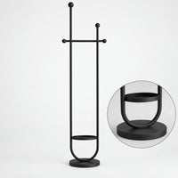 Portant sur pied design métal noir mat 190 cm : détail de la base circulaire et de la finition métal