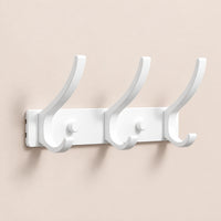 Crochet mural pliant blanc 3 crochets aluminium, porte-manteau mural blanc : vue complète sur mur beige