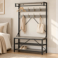 Meuble gris et noir dans une chambre, accessoires de mise en scène non inclus