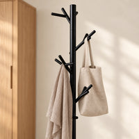 Porte-manteau moderne noir base plastique 175 cm : finition et accessoires en situation