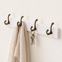 Porte-manteau mural en pin blanc, 4 crochets, 38 cm : utilisation