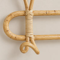 Détail des fibres de rotin et des liens autour des crochets