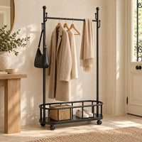 Porte-manteau sur pied métal noir 80 cm - portant à roulettes - mise en scène dans une entrée